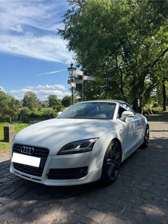 TT