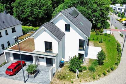 Luxuriöses Wohnen in exklusiver Lage - energieeffizientes Einfamilienhaus mit 251 m² 6 zimmer