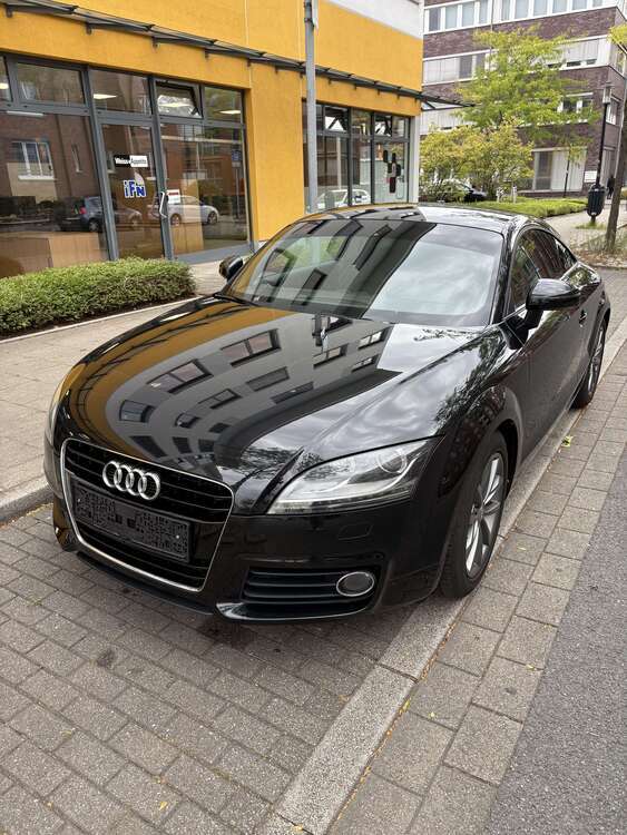 TT