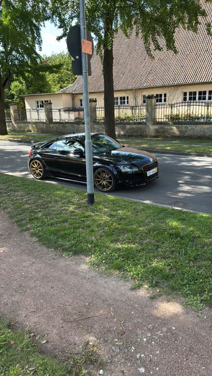 TT