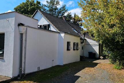 Wohn Geschäftshaus Stellplätze Bauland zimmer