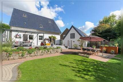 Ihr persönlicher Rückzugsort - Stilvoll modernisiertes Siedlungshaus mit Traumgarten 5 zimmer