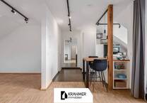 Düsseldorf-Kaiserswerth: Helle, modernisierte Dachgeschoßwohnung mit TG-Stellplatz