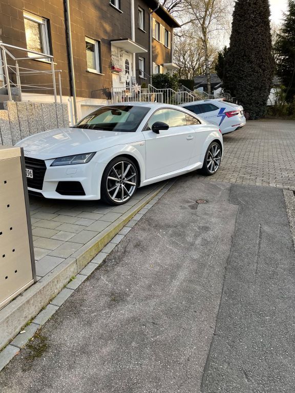 TT