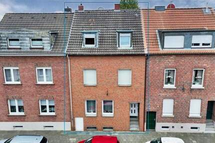 Charmantes 3-Familienhaus mit Garten und solider Mieteinnahme - vielseitig nutzbar 7 zimmer